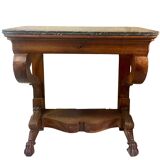 Console inlaid with black marble and lion's paw legs.