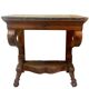 Console inlaid with black marble and lion's paw legs.