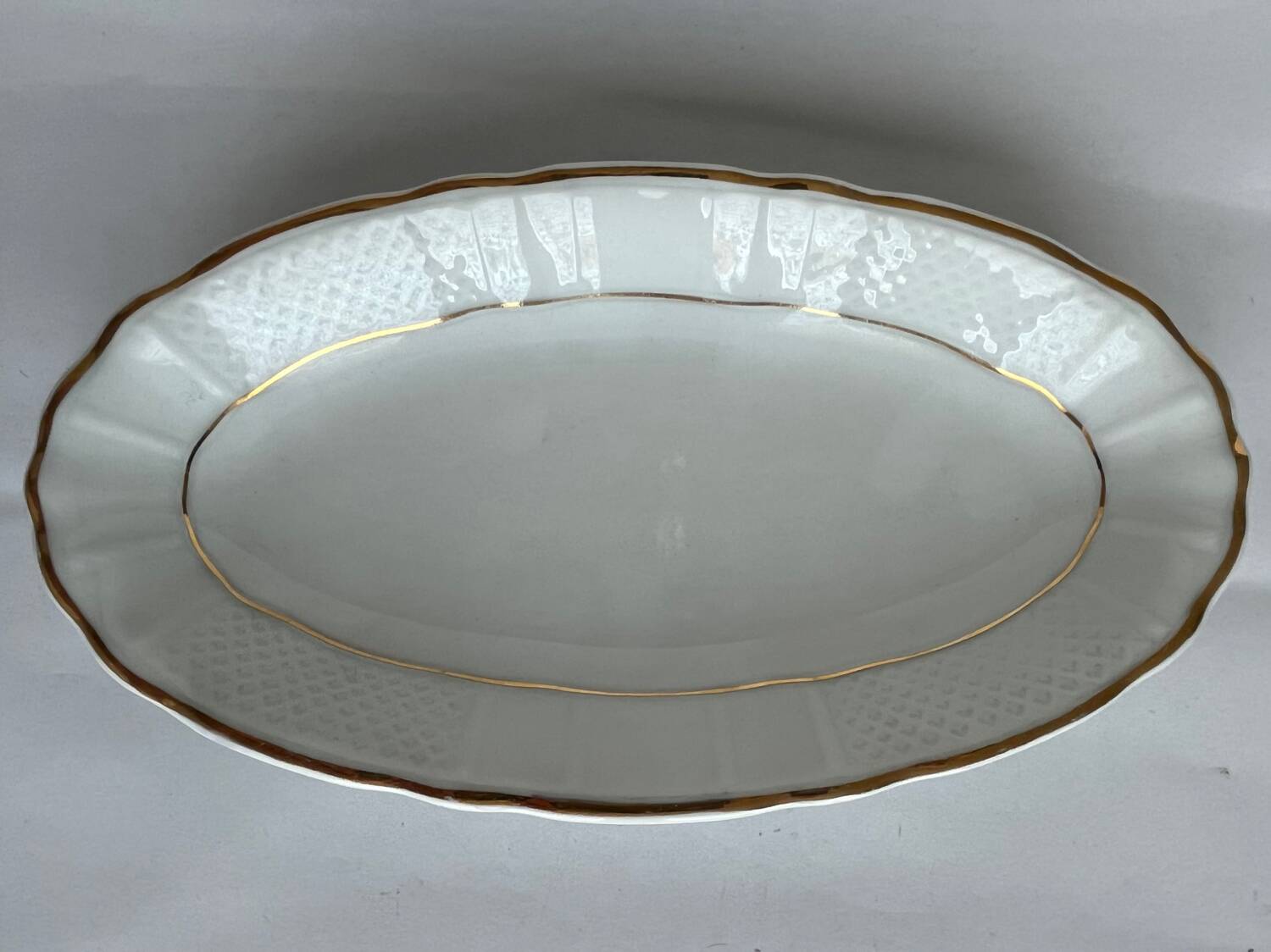 2 white porcelain ramekins