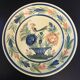 Assiette ancienne en faïence hb henriot quimper décor de panier floral et oiseau
