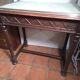 Antique display cabinet in 19th-century Gothic Revival style.