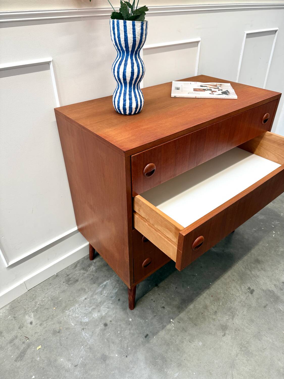 Scandinavian chest of drawers with compass feet