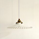 Crenellated opaline suspension
