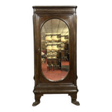 Renaissance style oval mirror cabinet in solid walnut circa 1850