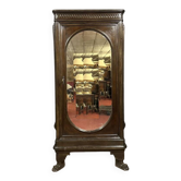 Renaissance style oval mirror cabinet in solid walnut circa 1850
