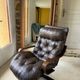 1970s Scandinavian armchair in curved laminated wood with a leather seat.