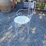 Ancien fauteuil de jardin en fer forgé