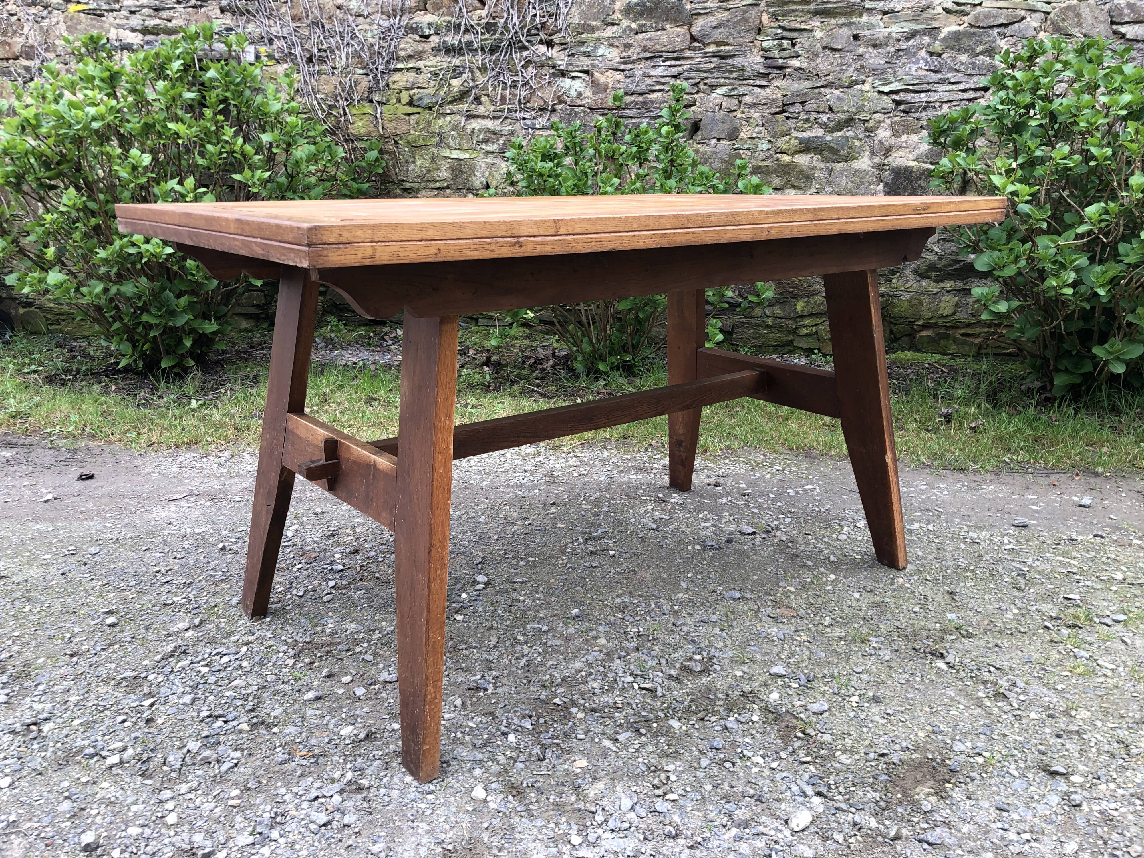 Vintage René Gabriel oak table from the reconstruction period.