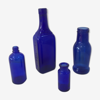 Lot of 4 blue pharmacy bottles