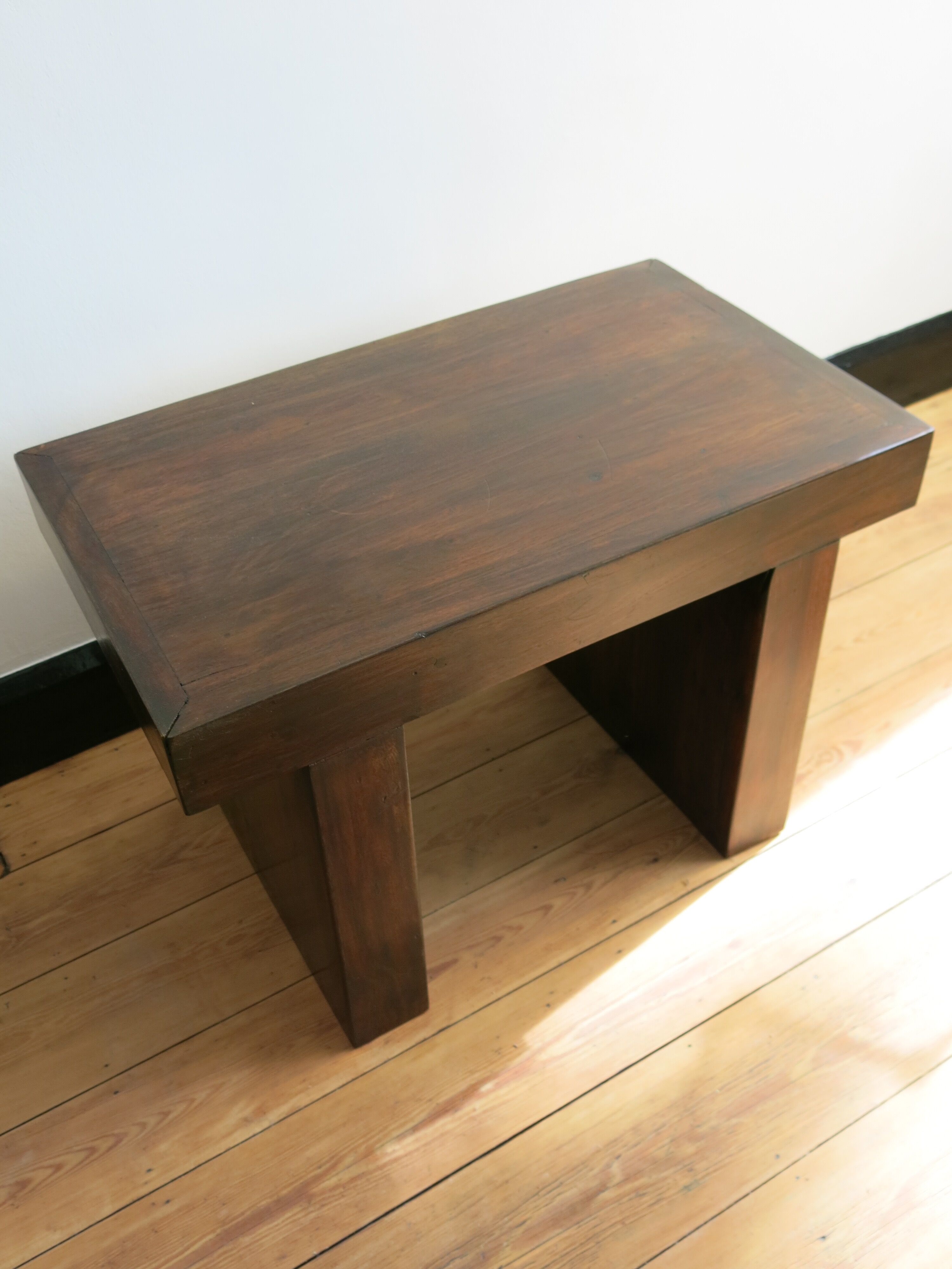 Solid bench made of tropical wood