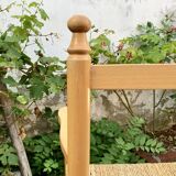 Old wooden and straw high chair for children