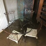 wrought iron table and 4 chairs