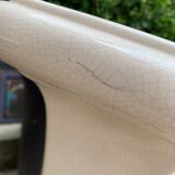 Column wears vintage plant