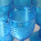 Old table set in blue pressed moulded glass