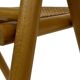Chaise pliante vintage en bois avec assise en rotin design minimaliste des années 80