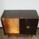 A vintage cabinet with a record player and a bar, 1960s.