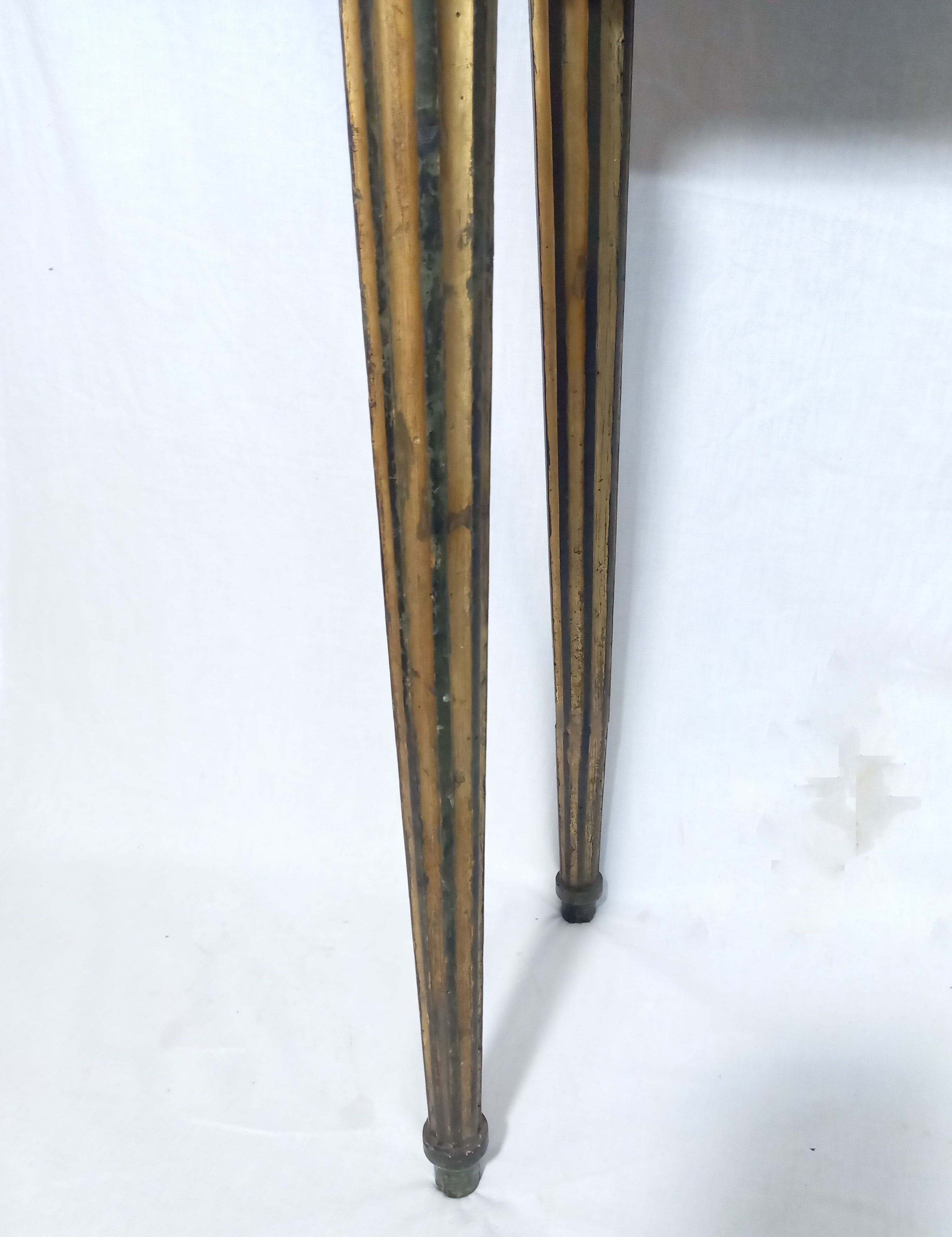 19th century Louis XVI style console table in black and gold with white marble shelf