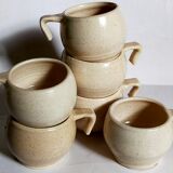 Six vintage potter's ceramic cups with vanilla enamel