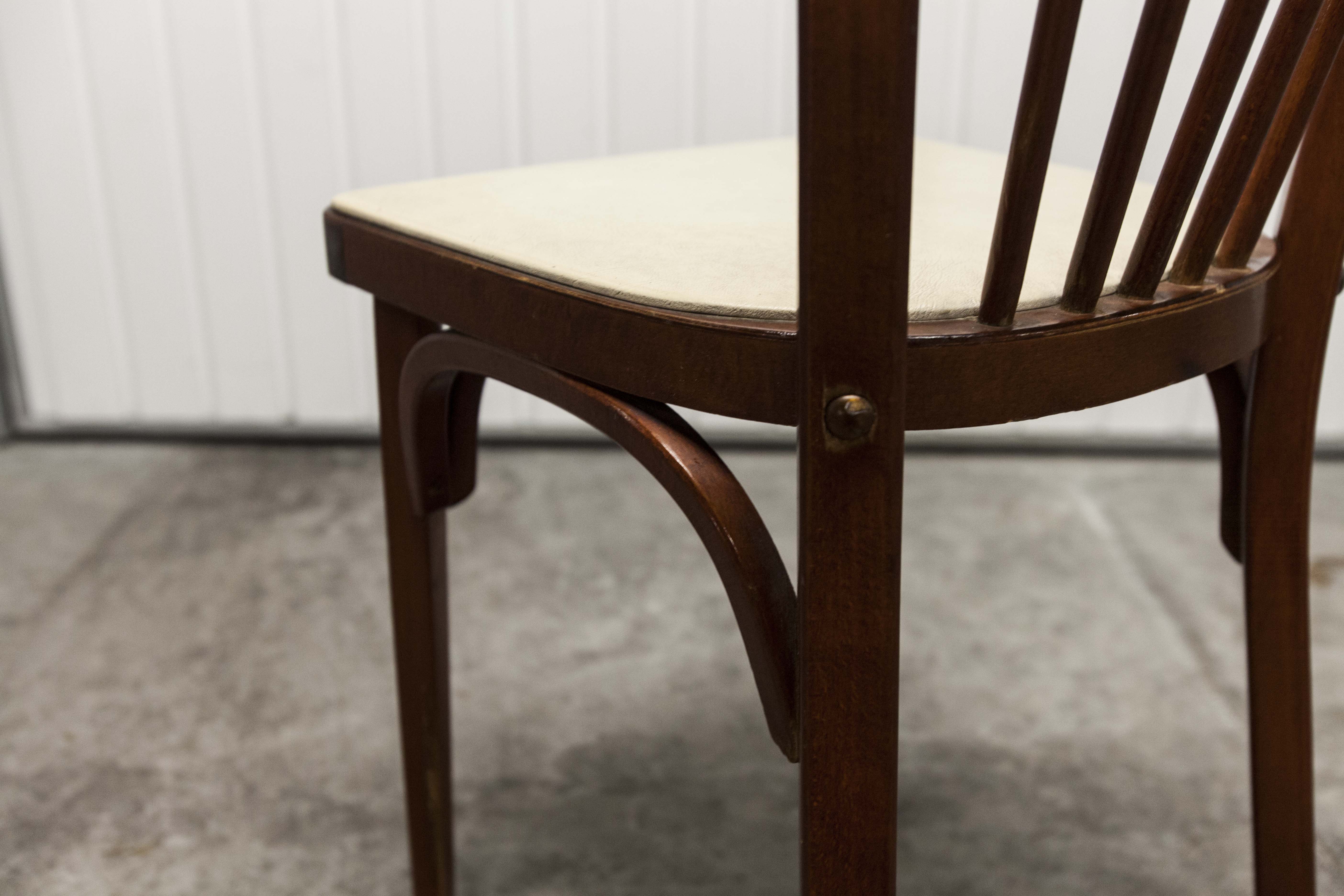 Baumann chair 153 in dark wood and white skai