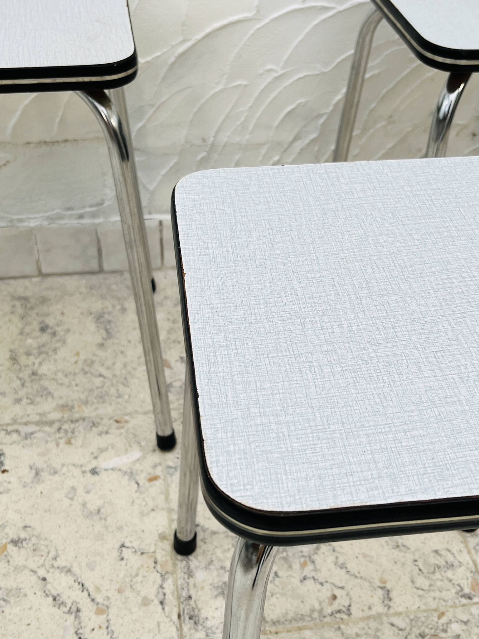 Set of 4 vintage grey chrome Formica stools.