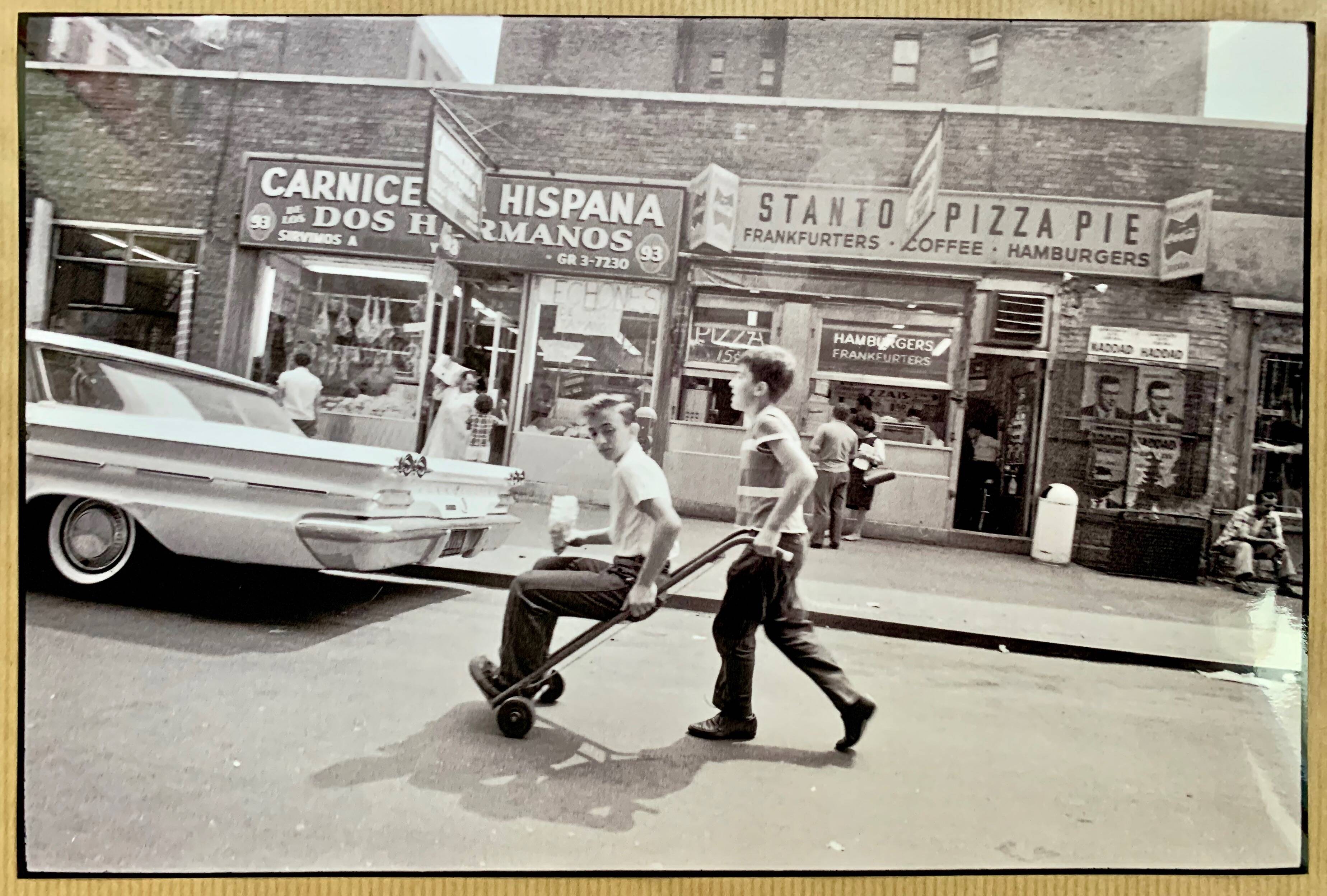 Little Italy – NYC 1964 A lively and spontaneous street scene.