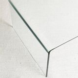 Transparent tempered glass coffee table.