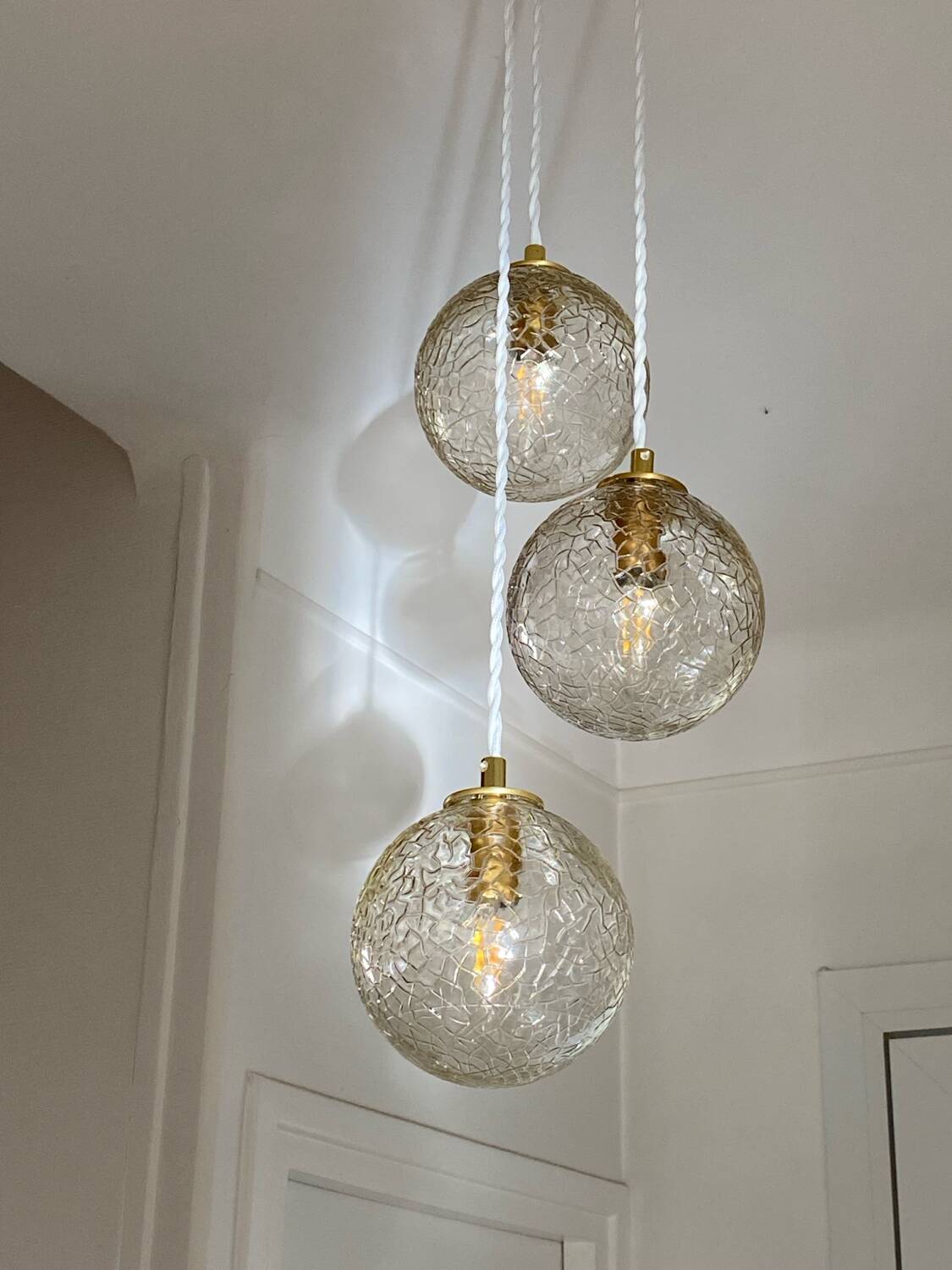 Triple pendant light with vintage glass globes