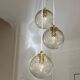 Triple pendant light with vintage glass globes
