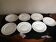 Series of 7 vintage dessert plates