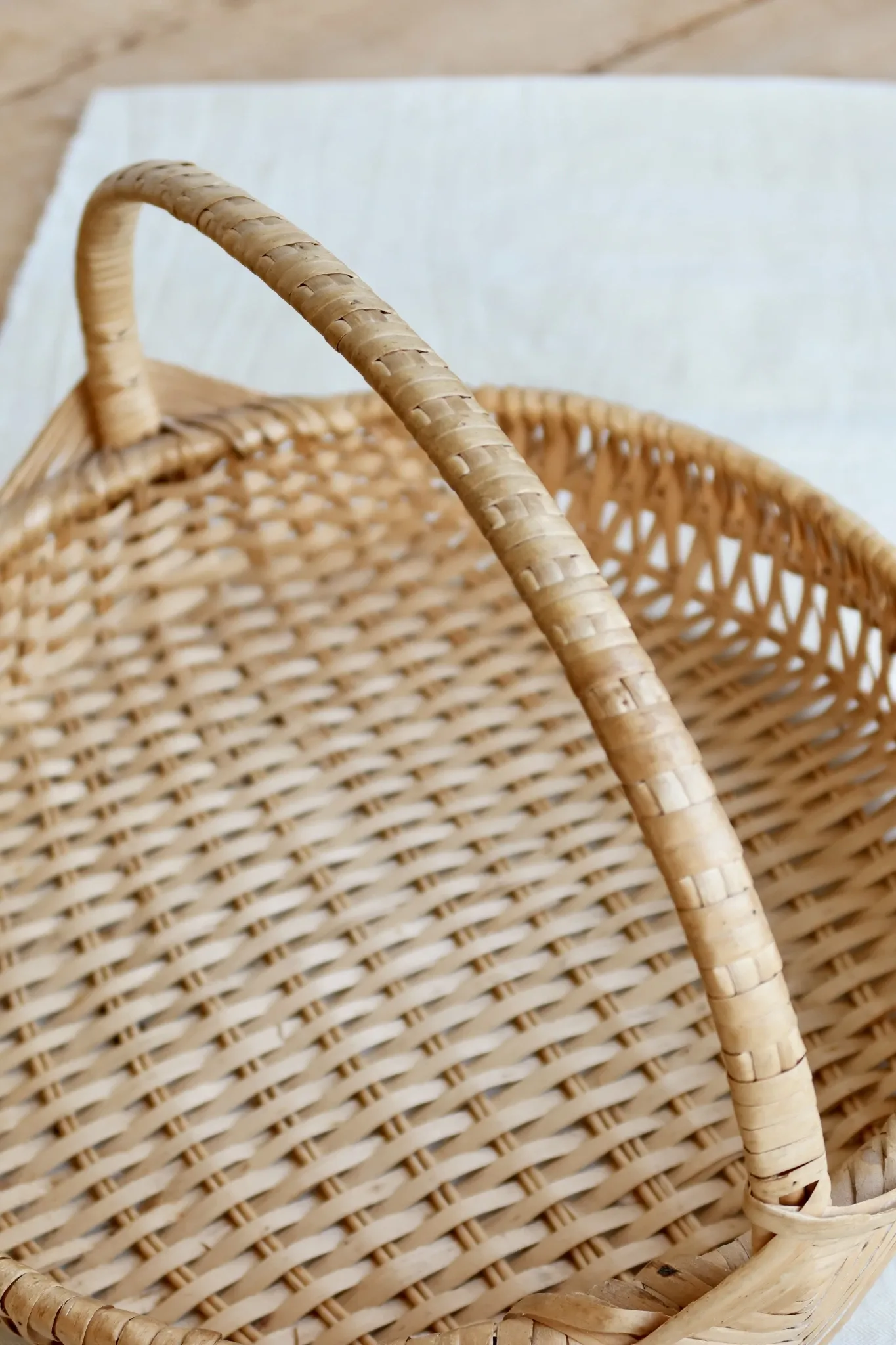 Vintage hand-woven wicker harvest basket