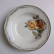 3 Digoin Sarreguemines Adèle plates in grey, yellow, and burgundy.