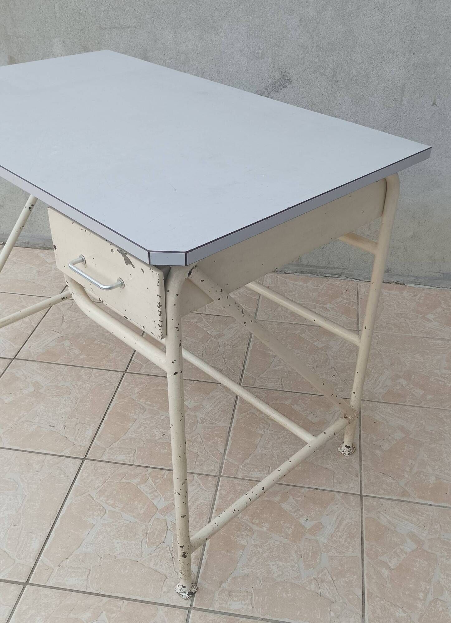 Industrial high table made of metal and formica.
