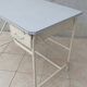 Industrial high table made of metal and formica.