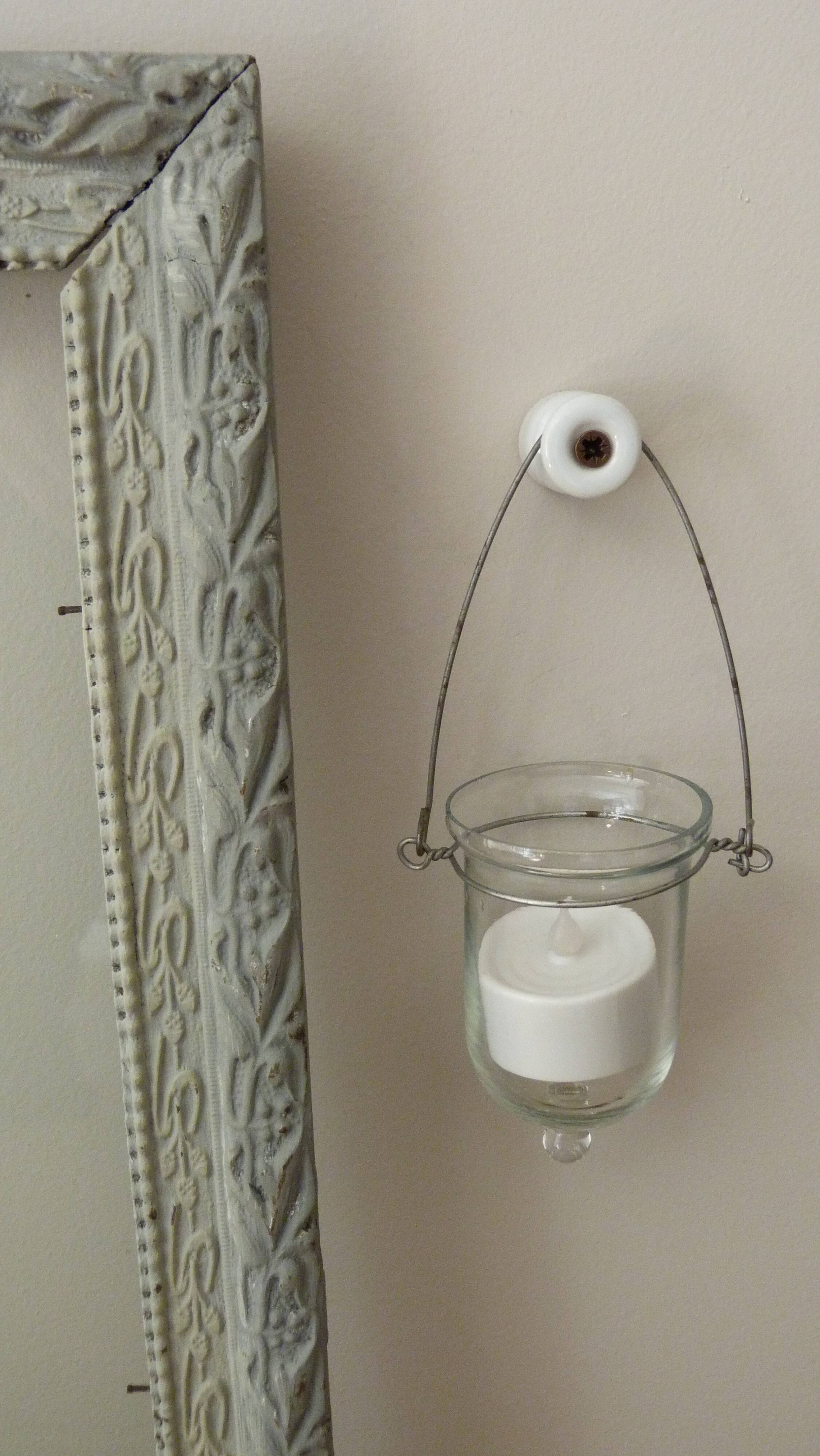 Patinated frame with glass