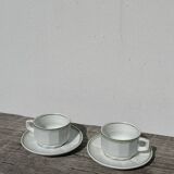 Pair of vintage Apilco style bistro cups in white and green ceramic