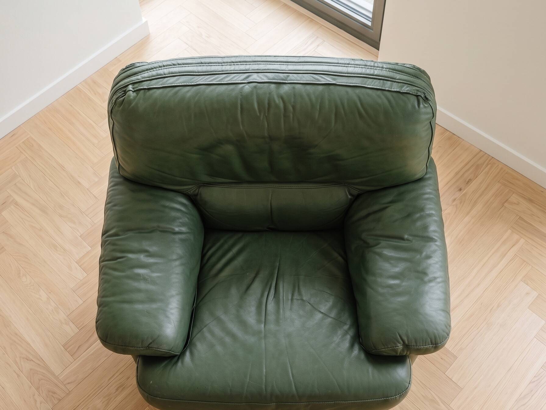 Vintage green leather armchair