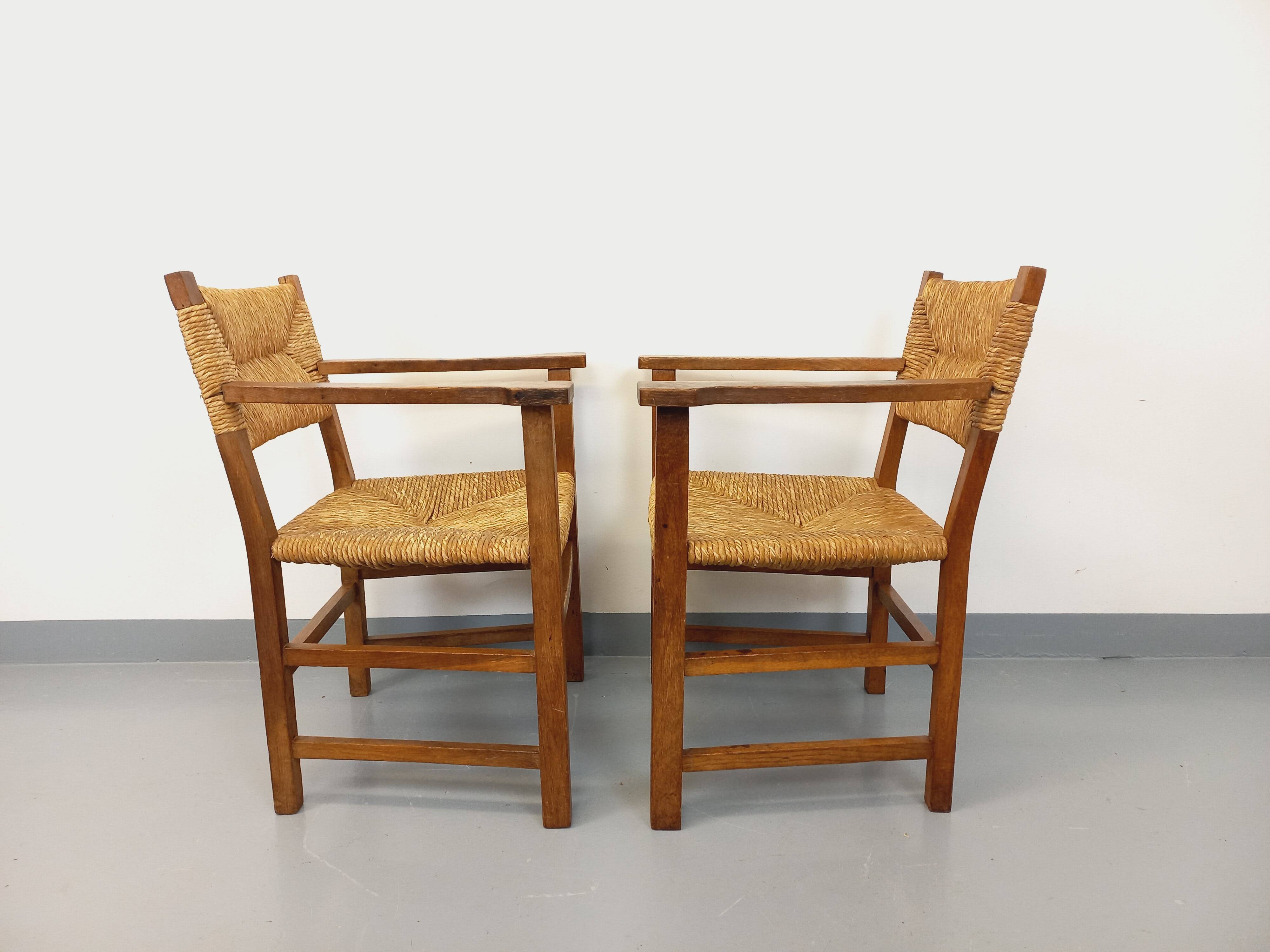 Set of 2 vintage brutalist armchairs in oak wood and straw