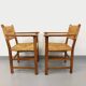 Suite de 2 fauteuils brutalistes vintage en bois de chêne et paille