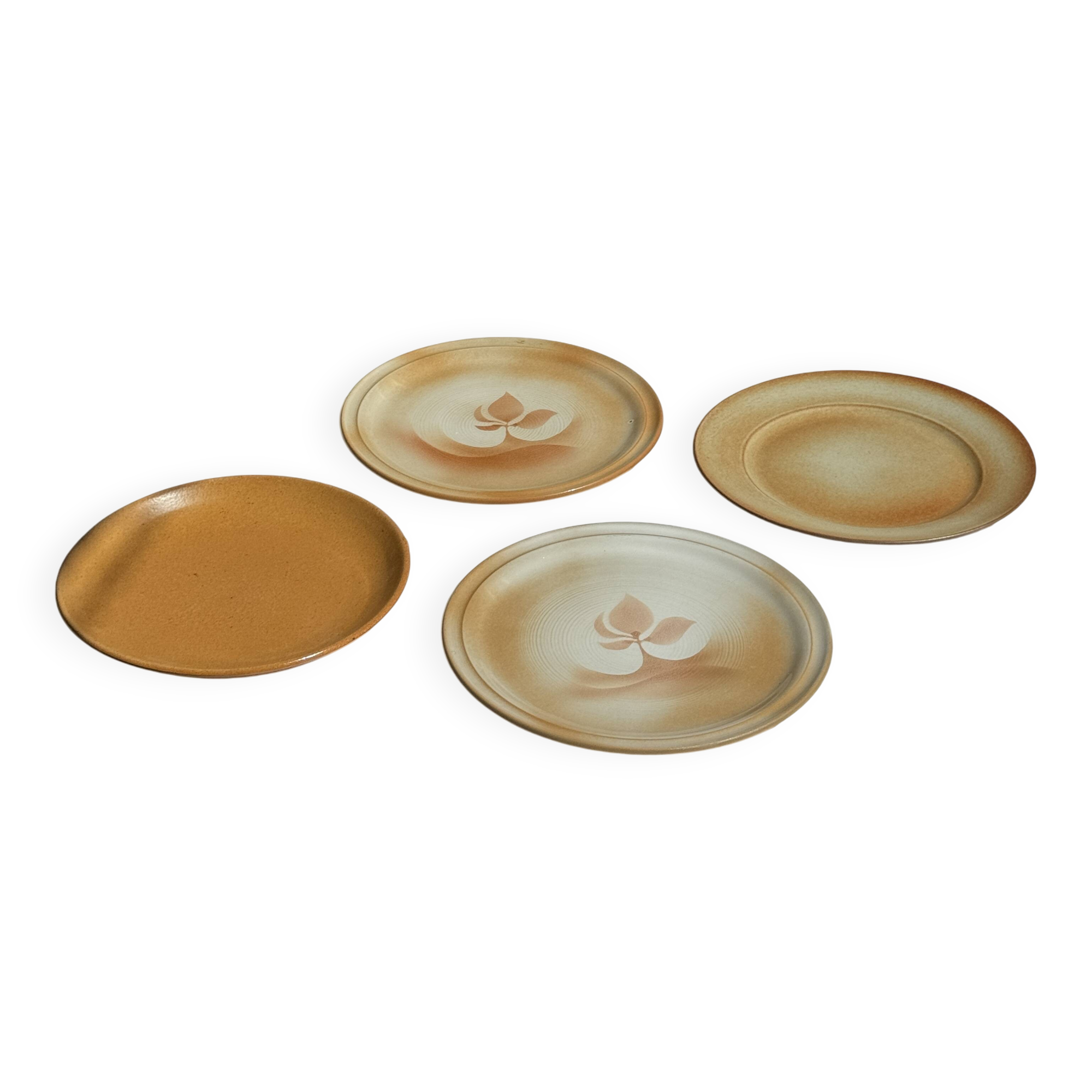 Set of 4 vintage stoneware plates, including 2 with floral motifs
