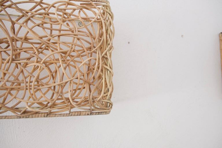 Pair of rattan wall lamps