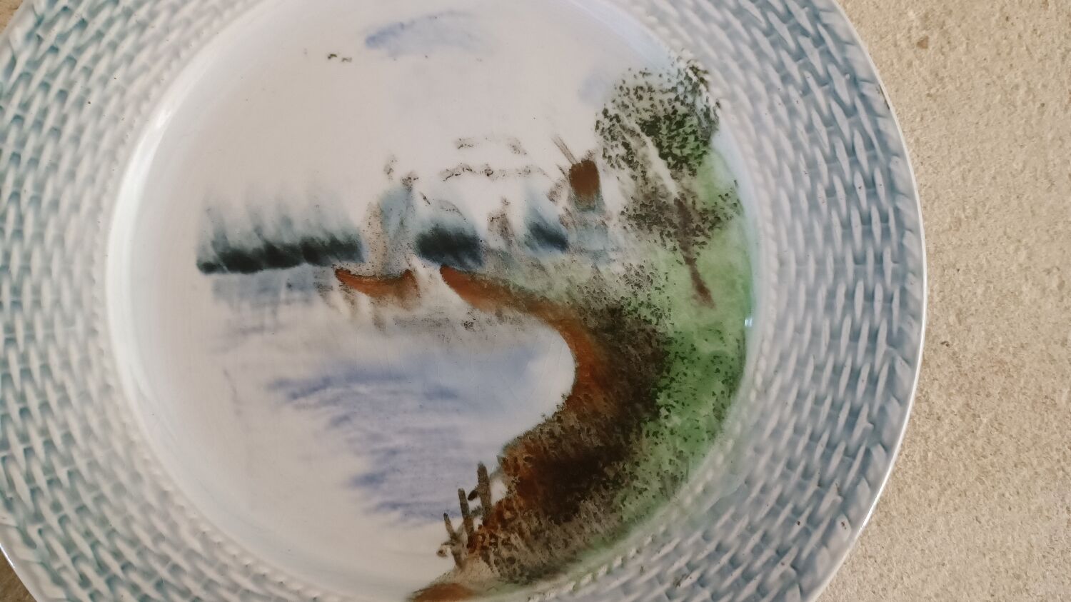 2 Saint Amand plates with castle decor