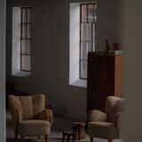 Pair of Danish Art Deco modern lounge chairs in sheepskin with lambswool and elm, 1940s.