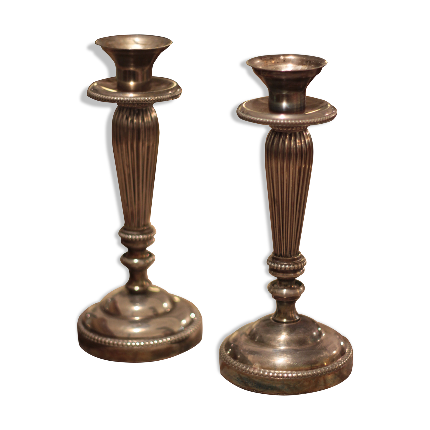 Pair of silver metal candlesticks
