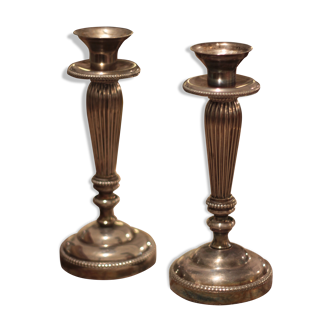 Pair of silver metal candlesticks