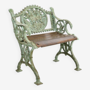 Small carved cast iron bench