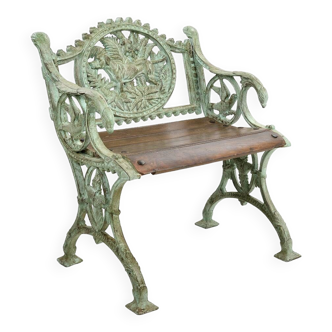 Small carved cast iron bench