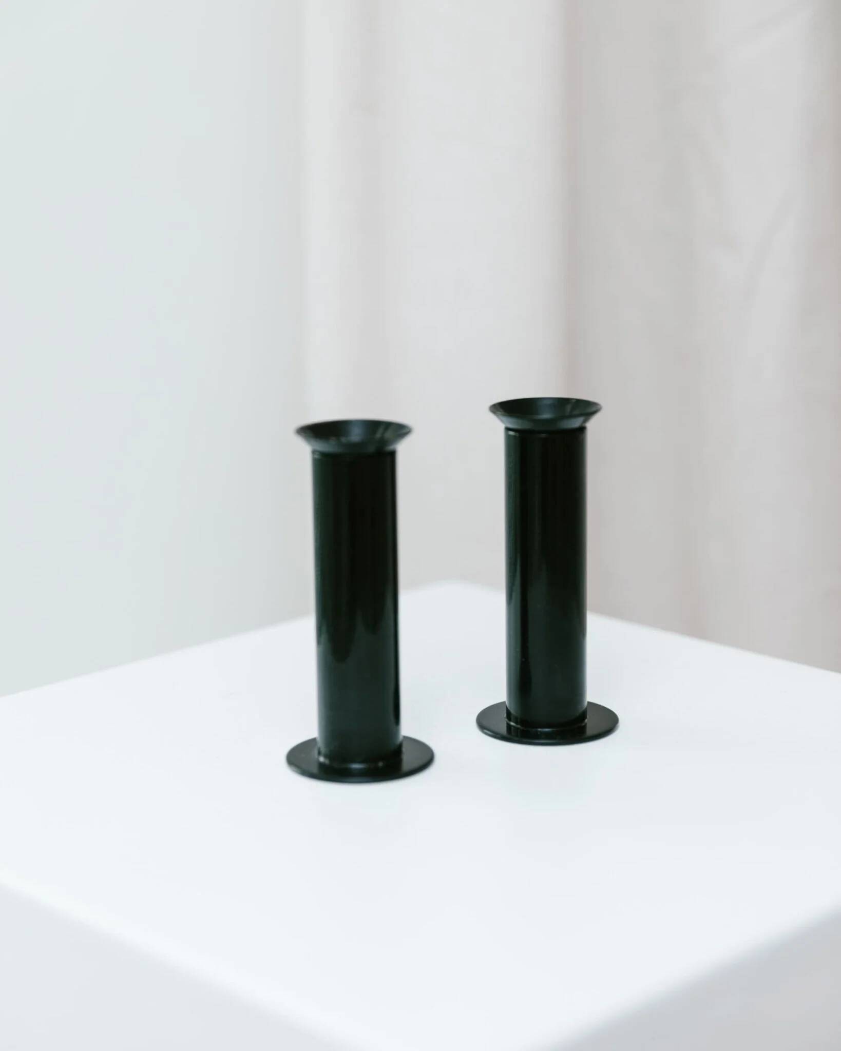 Set of 2 glossy black metal candleholders in retro Ikea Memphis style
