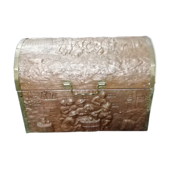 Wooden chest and hammered copper