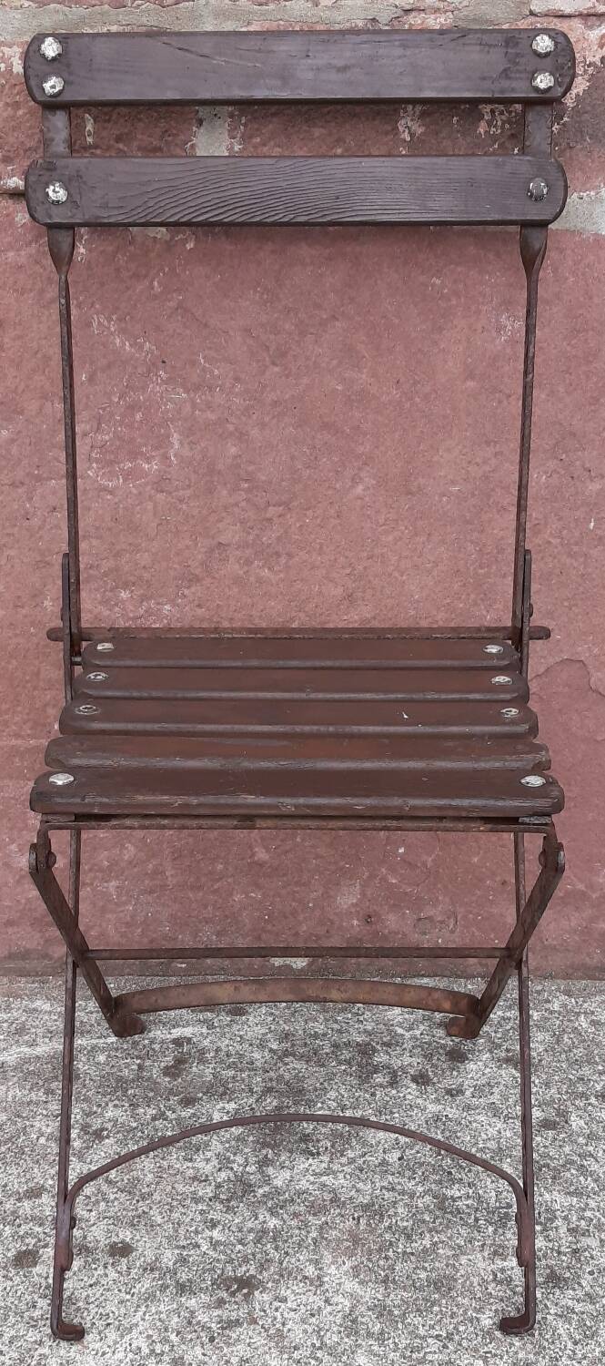 Foldable wrought iron chair