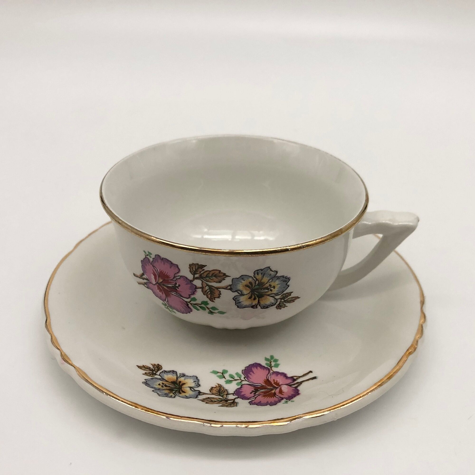 Coffee service 6 cups with saucers, sugar bowl and creamer.